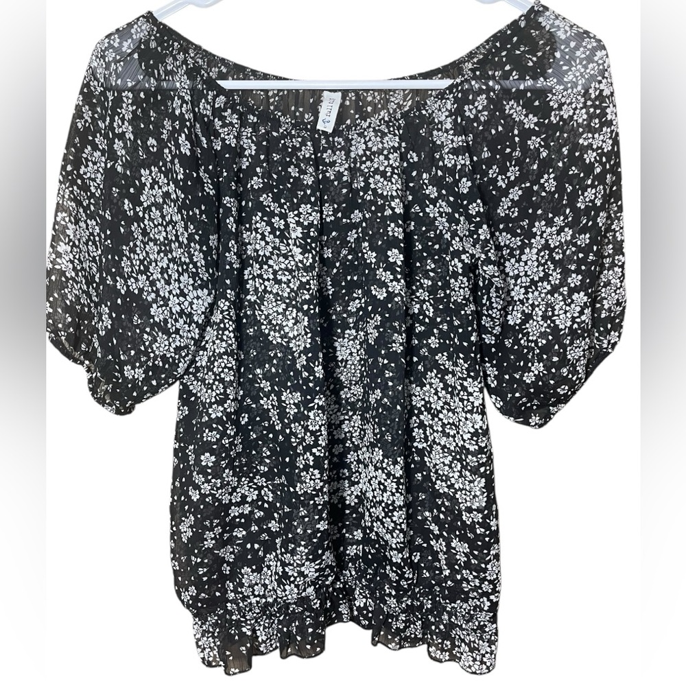 Full tilt, sheer, smocked, black and floral top. Size Small.